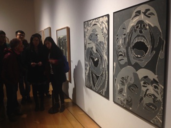 Students discuss the work of Fang Lijun